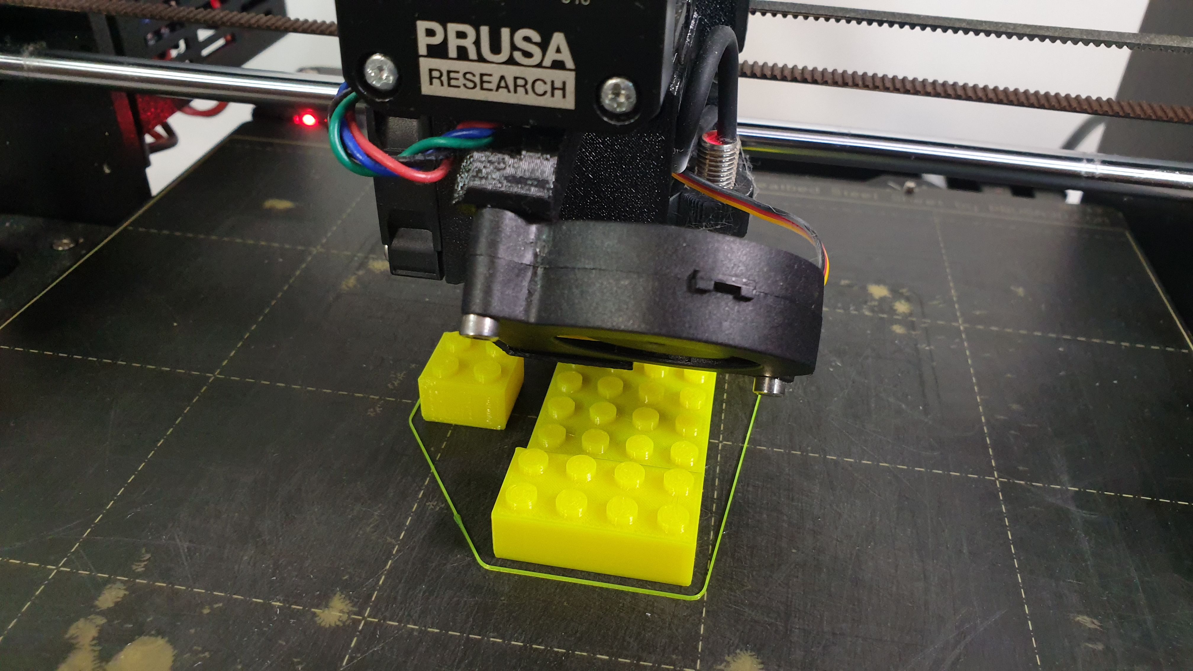 The STL model for the 3D printed LEGO brick is imported into the slicer software